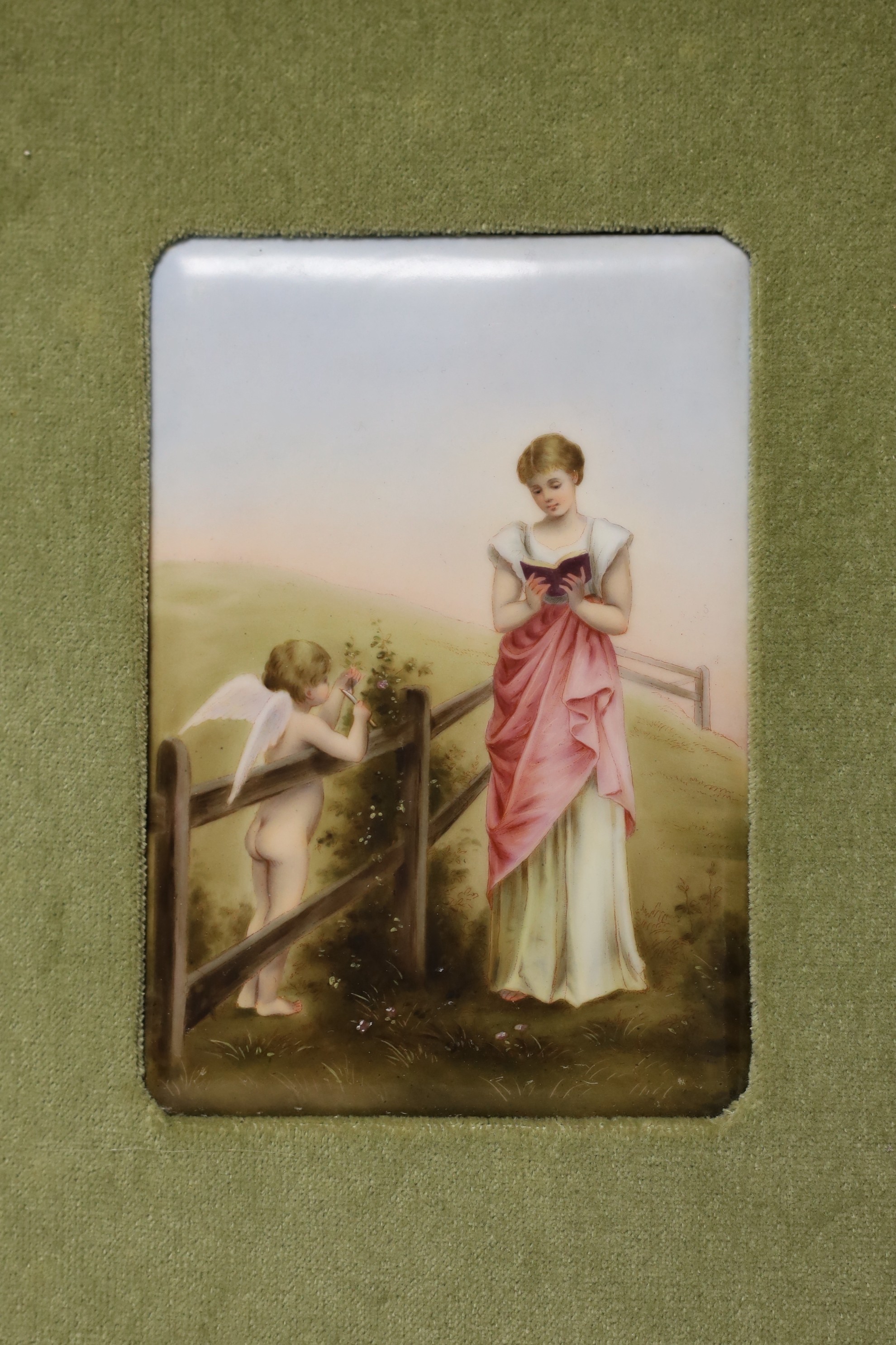 A Dresden porcelain plaque in velvet and gilt mount